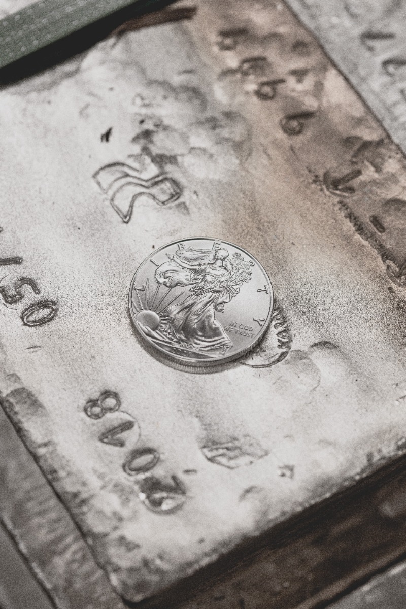 silver US coin on a stone surface